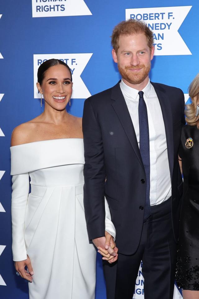 Meghan looks timeless in a white Louis Vuitton gown