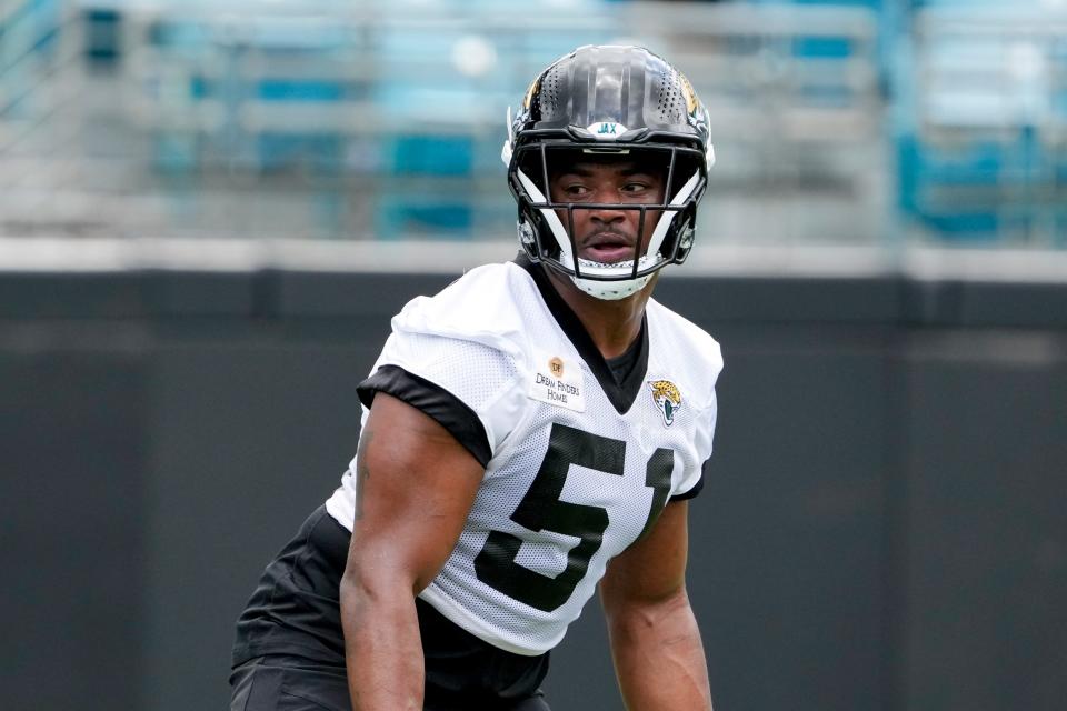 Jacksonville Jaguars linebacker Ventrell Miller works on a defensive drill during an NFL football rookie camp, Friday, May 12, 2023, in Jacksonville, Fla. (AP Photo/John Raoux)