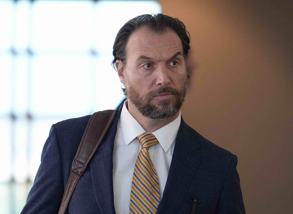 Attorney Reid Elkus walks into the Adams County Justice Center for the start of a trial of two of the police officers charged in the death of Elijah McClain, Wednesday, Sept. 20, 2023, in Brighton Colo. (AP Photo/Jack Dempsey)