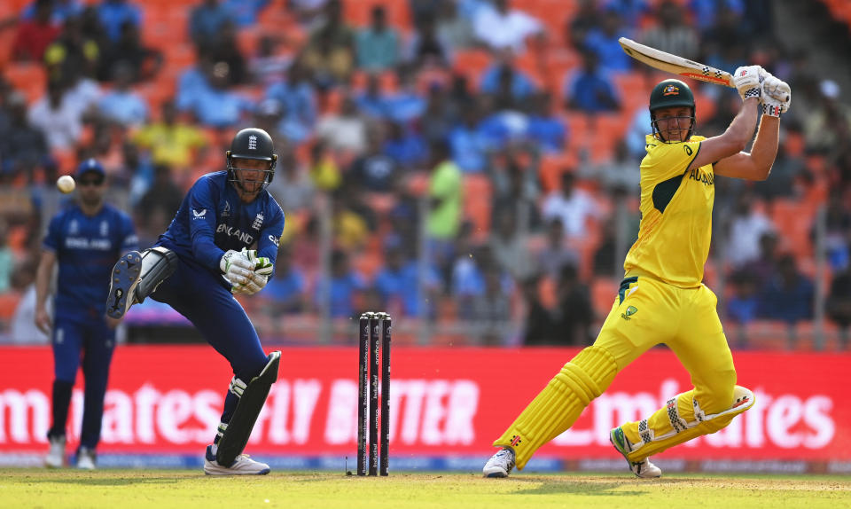 AHMEDABAD, INDIA - NOVEMBER 04: Cameron Green of Australia plays a shot as Jos Buttler of England keeps during the ICC Men's Cricket World Cup India 2023 between England and Australia at Narendra Modi Stadium on November 04, 2023 in Ahmedabad, India. (Photo by Gareth Copley/Getty Images)