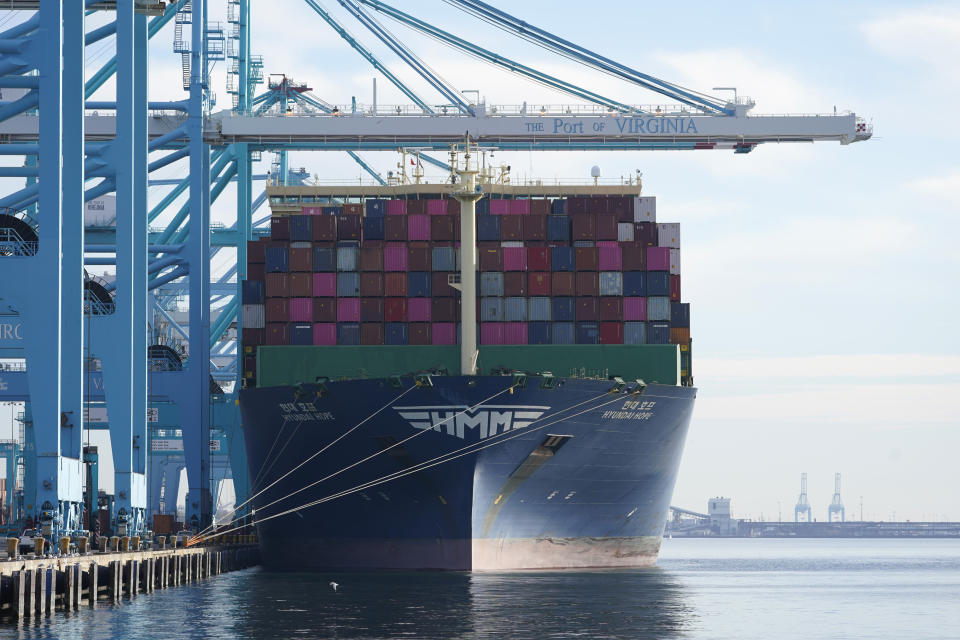 The container ship Hyundai Hope sits pier side as it is loaded at the Norfolk International Terminal Wednesday Dec 1, 2021, in Norfolk, Va. (AP Photo/Steve Helber)