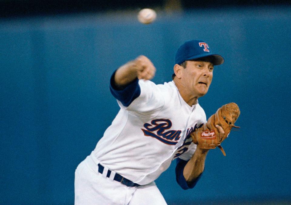 Texas Rangers pitcher Nolan Ryan throws against the Toronto Blue Jays during first inning American League play, Wednesday, May 1, 1991, Arlington, Tex. Ryan got his seventh career no hitter while throwing 16 strikeouts. (AP Photo/Bill Janscha)