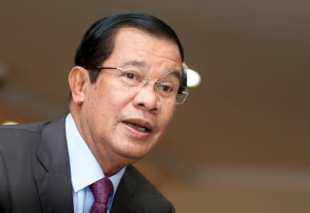 Cambodia's Prime Minister Hun Sen arrives before a plenary session at the National Assembly of Cambodia, in central Phnom Penh, October 12, 2017. REUTERS/Samrang Pring