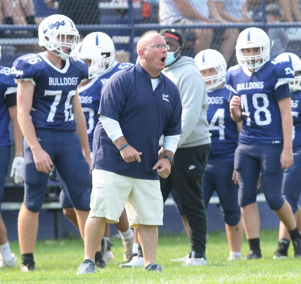 Rockland High School head football coach Nick Liquori calls out instructions against Cumberland, Rhode Island, High School on Sunday,  Sept. 12, 2021.