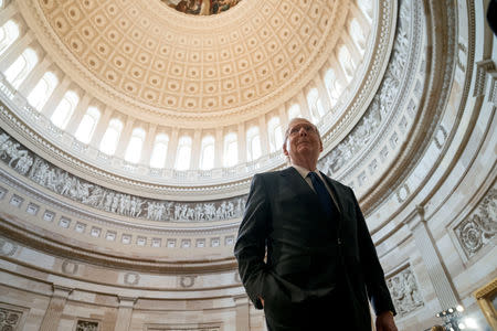 Senate Majority Leader Mitch McConnell walks through the Rotunda before the casket of U.S. Senator John McCain lies in state at the U.S. Capitol in Washington, U.S., August 31, 2018. Andrew Harnik/Pool via REUTERS