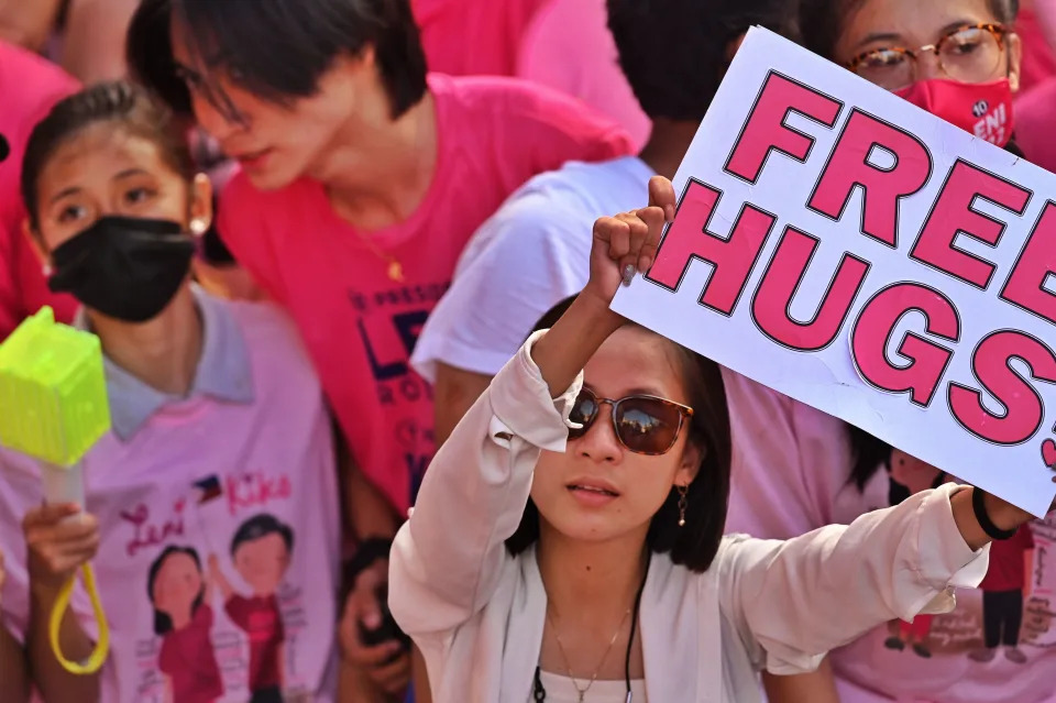 Supporters of Philippine Vice President and presidential candidate Leni Robredo attend a campaign rally at Makati business district in suburban Manila on May 7, 2022. (Photo by CHAIDEER MAHYUDDIN / AFP) (Photo by CHAIDEER MAHYUDDIN/AFP via Getty Images)