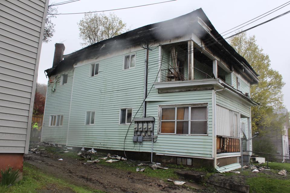 The Wellsville Fire Department remained on the scene of a structure fire at 11 a.m. Tuesday after a blaze broke out at 46 N. Broad. St. in the early morning hours.