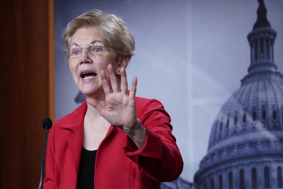 FILE - In this March 1, 2021 file photo, Sen. Elizabeth Warren, D-Mass., speaks during a news conference on Capitol Hill in Washington. The Democrats’ massive social spending and climate change bill could put the U.S. back on a path to reducing its persistent pool of uninsured people. Estimates range from 4 million to 7 million Americans gaining health coverage as a result of the legislation. (AP Photo/Susan Walsh)