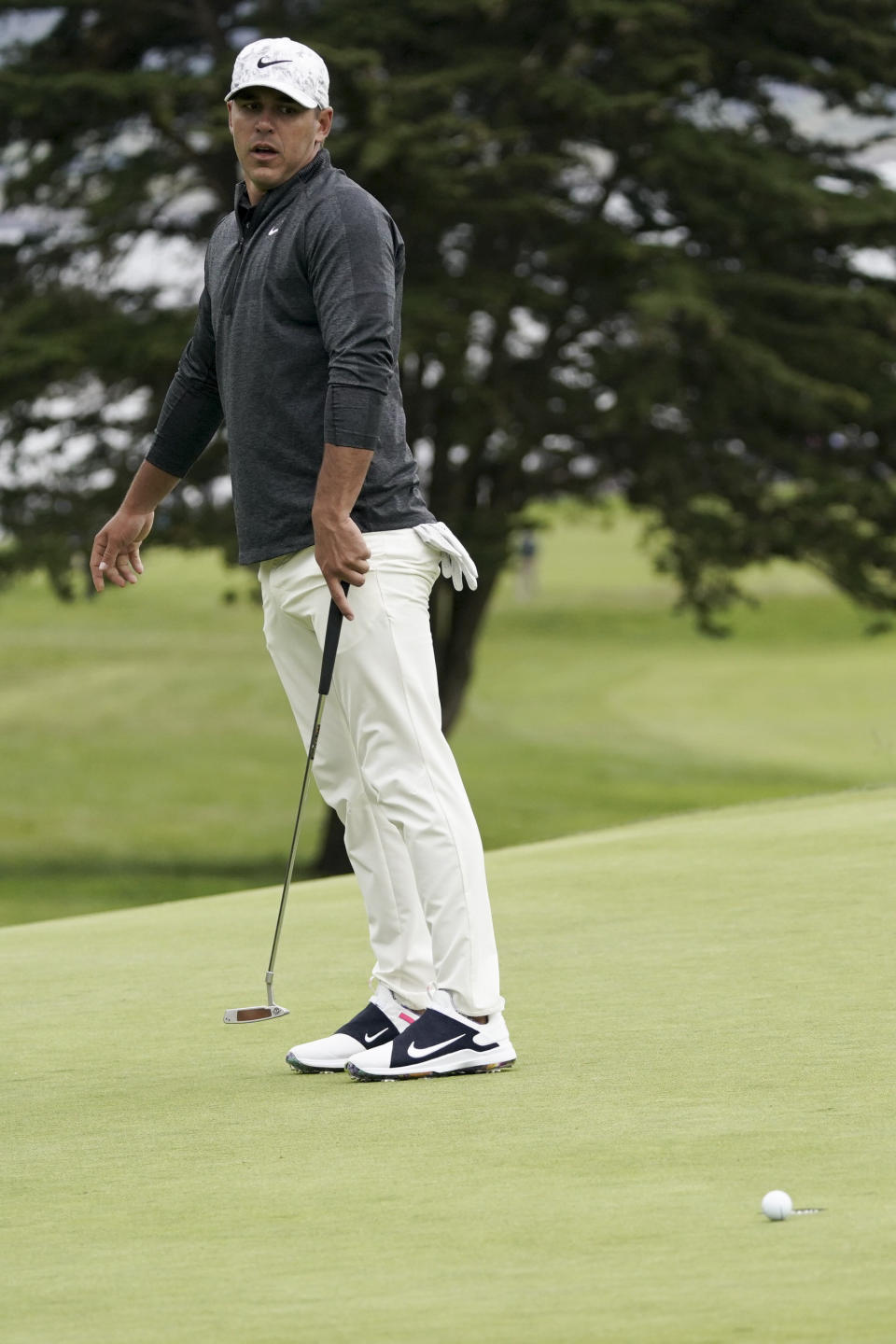 Brooks Koepka reacts after missing a putt on the 14th hole during the third round of the U.S. Open Championship golf tournament, Saturday, June 15, 2019, in Pebble Beach, Calif. (AP Photo/Carolyn Kaster)