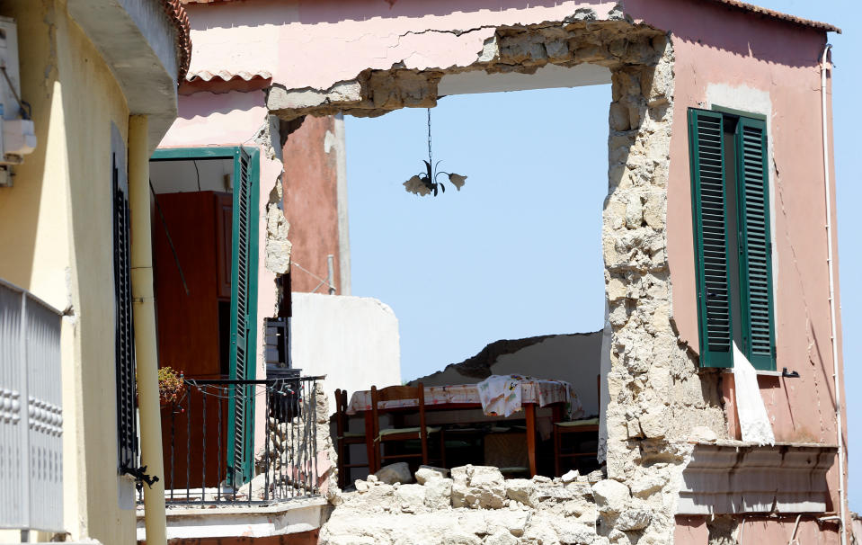 <p>A damaged house is seen after an earthquake hit the island of Ischia, off the coast of Naples, Italy, Aug. 22, 2017. (Photo: Ciro De Luca/Reuters) </p>