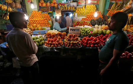 An advertisement of Paytm, a digital wallet company, is seen placed at a fruit stall in Kolkata, India, January 26, 2017. Picture taken January 26, 2017. REUTERS/Rupak De Chowdhuri