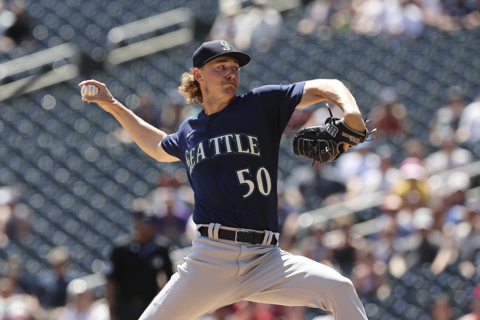 Seattle Mariners pitcher Bryce Miller (50) throws during the first inning of a baseball game against the Minnesota Twins, Wednesday, July 26, 2023, in Minneapolis. (AP Photo/Stacy Bengs)