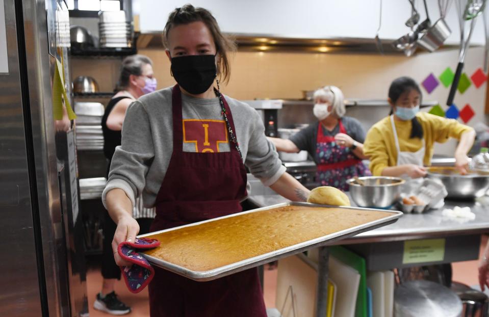 Food at First volunteer Jessica Nelson prepares Thanksgiving meals at First Christian Church Monday, Nov 22, 2021, in Ames, Iowa