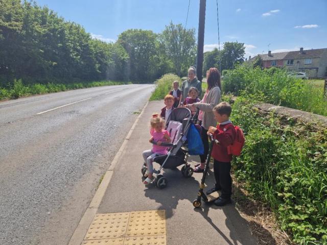 Wiltshire Times: Children crossing Bradford Road where the limit is 50mph