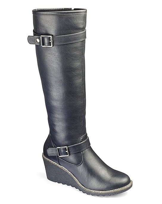 <a href="https://www.simplybe.com/en-us/products/heavenly-soles-knee-high-boots/p/FT904#v=1000000027%3AE%7Ccolor%3AFT904_BLACK%7C" target="_blank">Shop them here</a>.&nbsp;