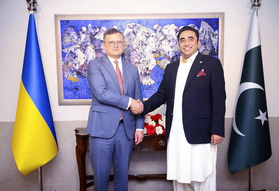 In this handout photo released by Pakistan Foreign Ministry Press Service, Pakistan's Foreign Minister Bilawal Bhutto Zardari, right, shakes hands with Ukraine's Foreign Minister Dmytro Kuleba in Islamabad, Pakistan, Thursday, July 20, 2023. (Pakistan Foreign Ministry Press Service via AP)