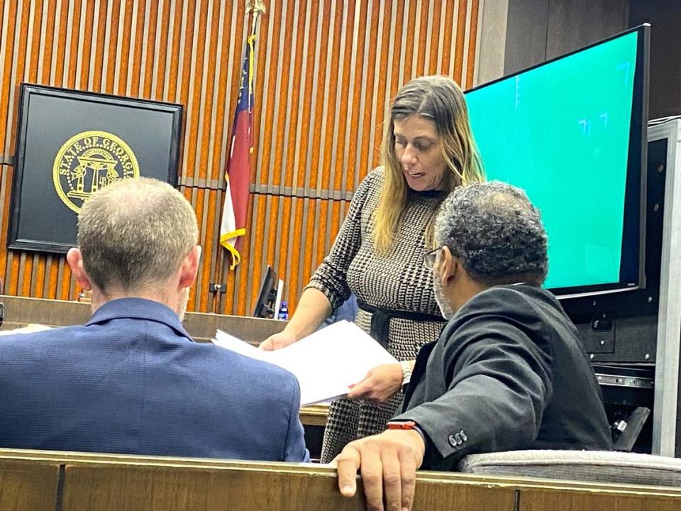 Emmanuel Truitt’s defense attorney Sirena Saunders discusses evidence with prosecutor Ray Daniel. Tim Chitwood/tchitwood@ledger-enquirer.com