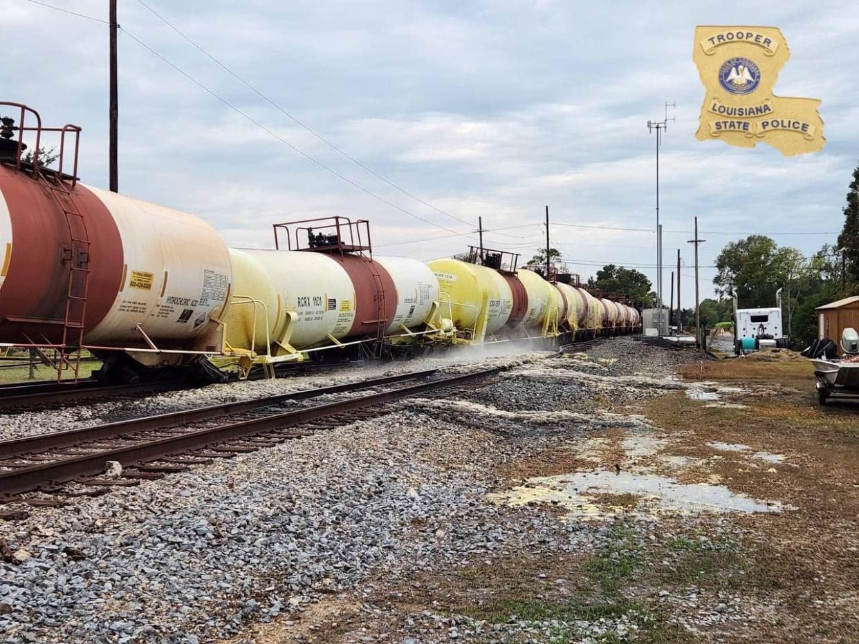 Louisiana State Police Emergency Services Unit personnel evaluated a train derailment in St. James Parish.