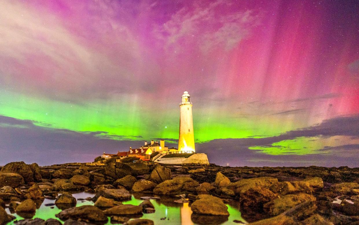 The Northern Lights behind St Mary's Lighthouse, just north of Whitley Bay, Tyne and Wear - Ian Sproat/pictureexclusive.com