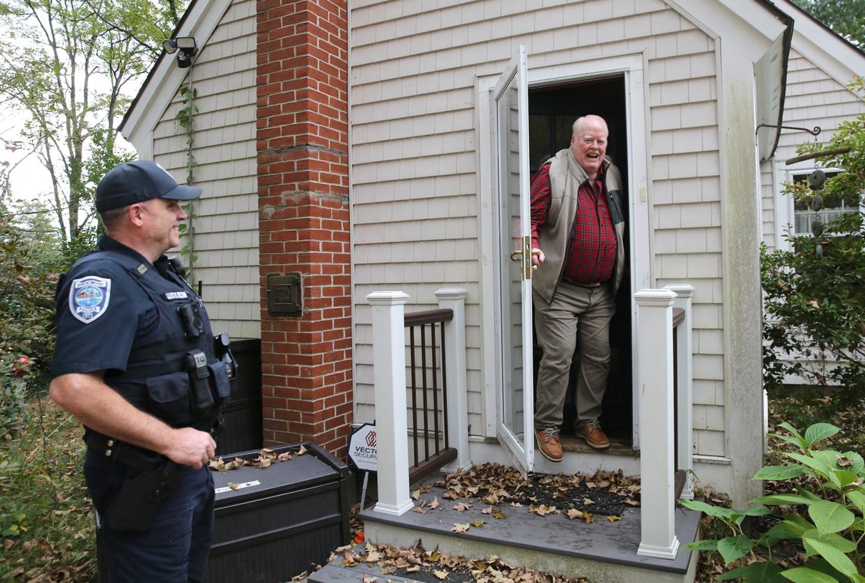 Brentwood resident David Eldridge comes out of his home to say thanks to officer Bob McConn for delivering his McDonald’s, DoorDash food delivery. McConn took over the delivery after the original driver was arrested for a suspended license.