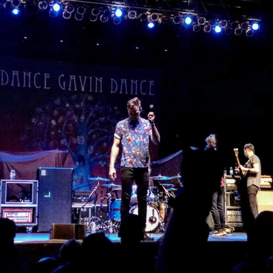 Dance Gavin Dance lead singer Tilian Pearson raises his mic in May, 2018 in Bethlehem, Pa.