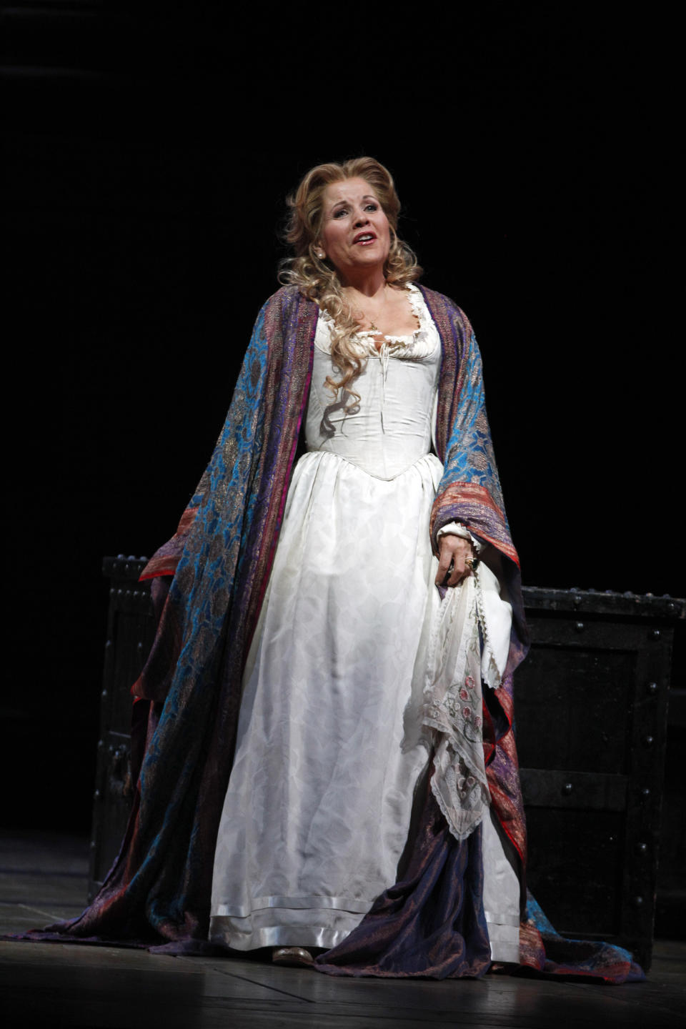 FILE - In this Friday, Oct. 5 2012 file photo, soprano Renee Fleming performs as Desdemona during the final dress rehearsal of Guiseppe Verdi's "Otello" at the Metropolitan Opera in New York. Fleming is participating along with Dr. Anthony Fauci, the CEO's of Moderna and Pfzer, and the lead guitarist of Aerosmith among others in a unique three-day Vatican conference starting Thursday, May 6, 2021, on COVID-19, other global health threats and how science, solidarity and spirituality can address them. (AP Photo/Mary Altaffer, file)