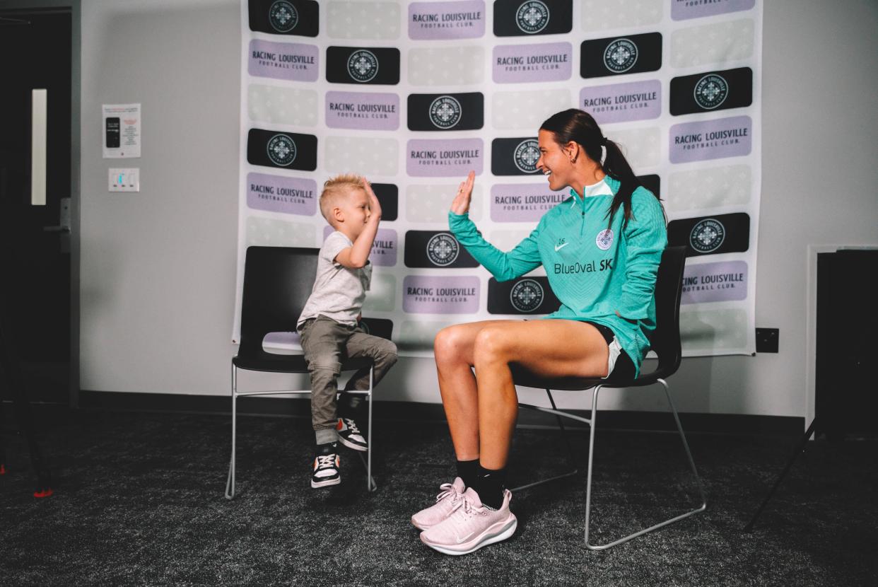 Carson Pickett, soccer player for Racing Louisville FC, reunites with Joseph Tidd, 6-years-old, for a pre-show segment set to air at 7 p.m. on Saturday, March 30 before a National Women's Soccer League doubleheader. The two went viral after bumping elbows in a 2019 photo.