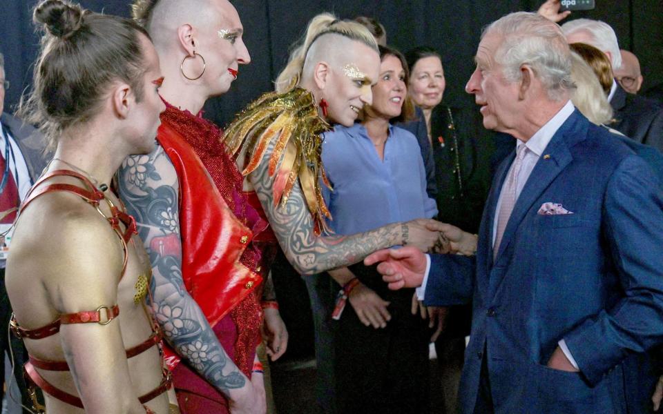 Charles meets members of heravy rock band Lord of the Lost on the final day of his visit - ADRIAN DENNIS/AFP via Getty Images