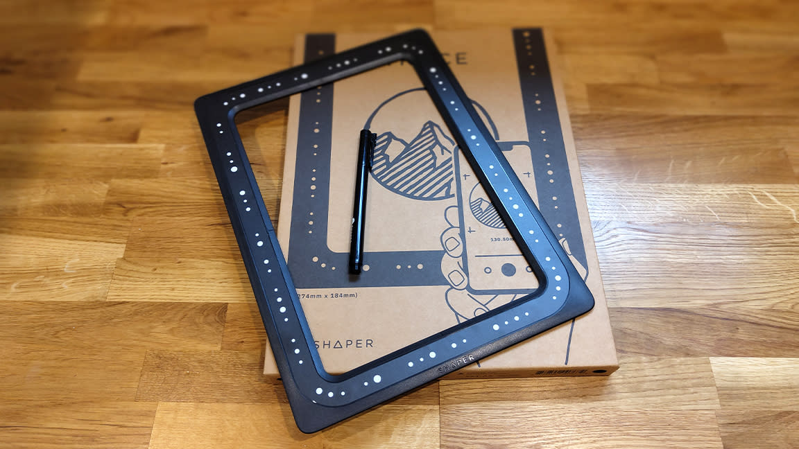  Shaper Trace review; a plastic frame on a card box 