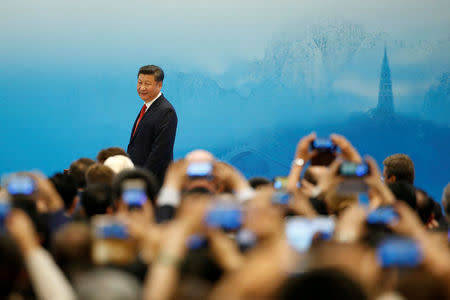 FILE PHOTO - China's President Xi Jinping arrives for the opening ceremony of B20 Summit ahead of G20 Summit, in Hangzhou, Zhejiang Province, China, September 3, 2016. REUTERS/Aly Song/File Photo