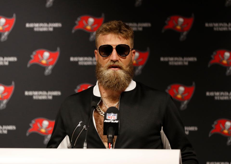 Tampa Bay Buccaneers quarterback Ryan Fitzpatrick talks during a post game news conference following an NFL football game against the Philadelphia Eagles, Sunday, Sept. 16, 2018, in Tampa, Fla. The Buccaneers defeated the Eagles 27- 21.