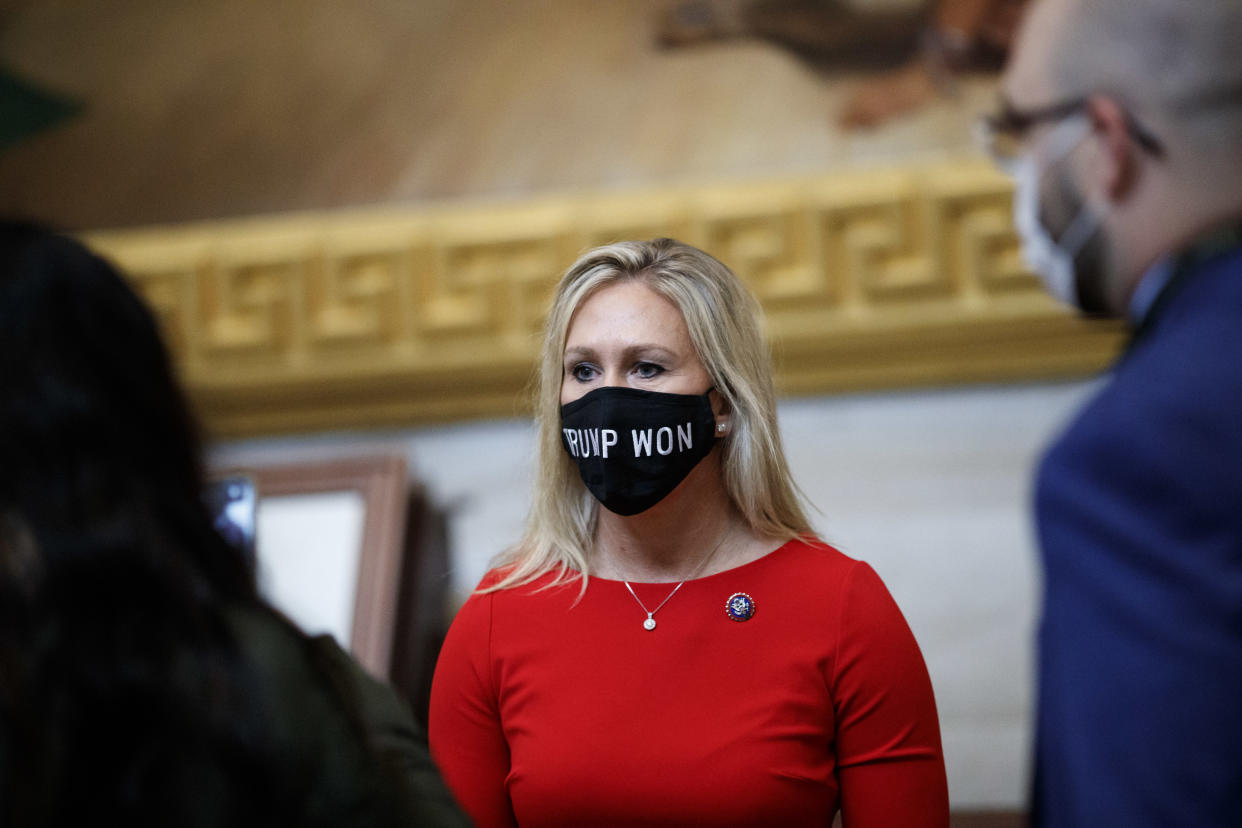 Representative-elect Marjorie Taylor Greene, a Republican from Georgia, wears a "Trump Won" protective mask at the U.S. Capitol. (Photographer: Ting Shen/Bloomberg via Getty Images)