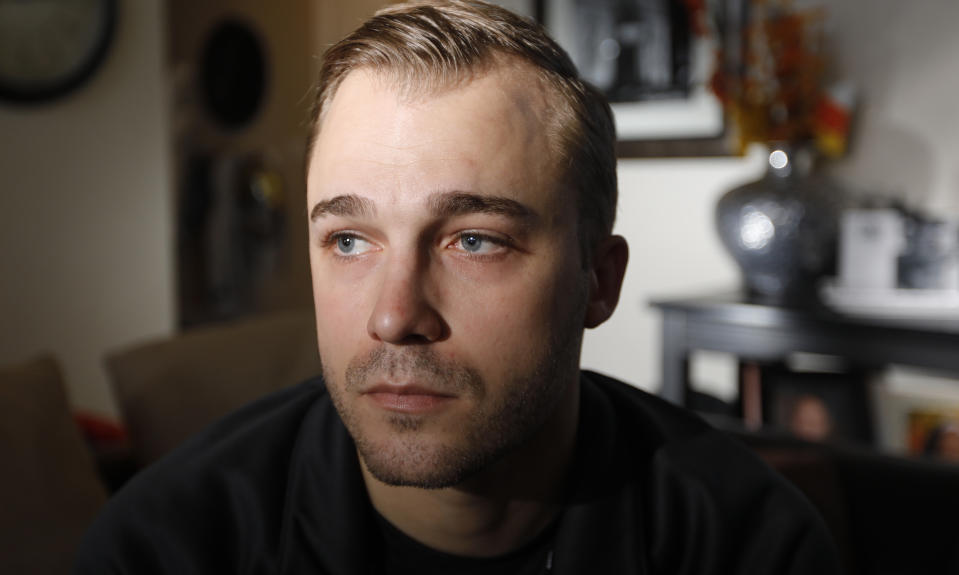 Austin Cloes, a Utah relative of Americans killed in Mexico in what appears to be an attack by the cartels, speaks during an interview Tuesday, Nov. 5, 2019, in Herriman, Utah. Drug cartel gunmen ambushed three SUVs along a dirt road, slaughtering at least six children and three women all of them U.S. citizens living in northern Mexico in a grisly attack that left one vehicle a burned-out, bullet-riddled hulk, authorities said Tuesday, Nov. 5, 2019. (AP Photo/Rick Bowmer)