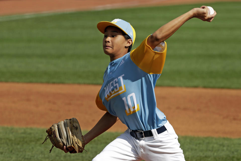 Wailuku, Hawaii's Logan Kuloloia delivers during the second inning of the United State Championship baseball game against River Ridge, Louisiana, at the Little League World Series tournament in South Williamsport, Pa., Saturday, Aug. 24, 2019. (AP Photo/Gene J. Puskar)