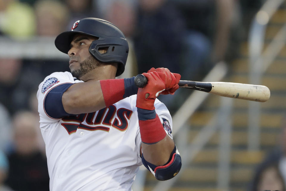 FILE - Minnesota Twins designated hitter Nelson Cruz (23) follows through on a single in the first inning of a spring training baseball game against the Pittsburgh Pirates in Fort Myers, Fla., in this Saturday, Feb. 29, 2020, file photo. Cruz is a free agent. (AP Photo/John Bazemore, File)