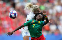 Alex Greenwood of England battles for possession with Gabrielle Aboudi Onguene of Cameroon during the 2019 FIFA Women's World Cup France Round Of 16 match between England and Cameroon at Stade du Hainaut on June 23, 2019 in Valenciennes, France. (Photo by Cathrin Mueller - FIFA/FIFA via Getty Images)