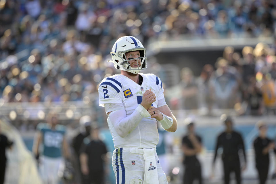 Indianapolis Colts quarterback Carson Wentz (2) looks at a stadium video monitor after a play during the second half of an NFL football game against the Jacksonville Jaguars, Sunday, Jan. 9, 2022, in Jacksonville, Fla. (AP Photo/Phelan M. Ebenhack)