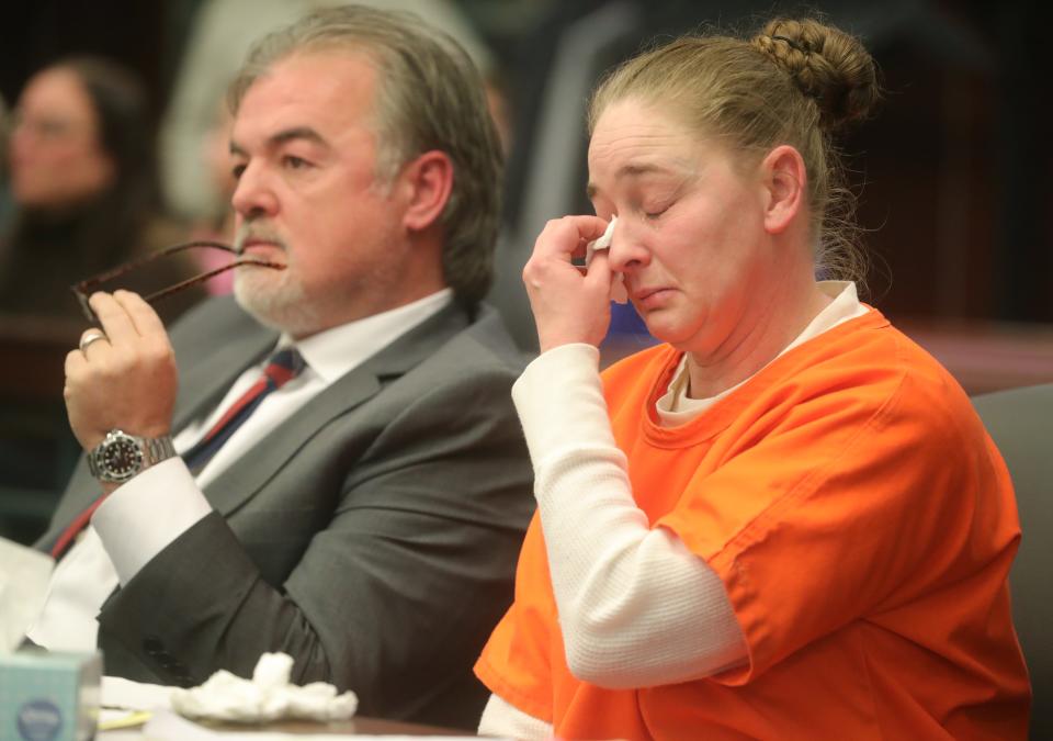 Julianne Shead sits next to defense attorney Jonathan Sinn as they listen to victim impact statements Wednesday at the Portage County Courthouse.