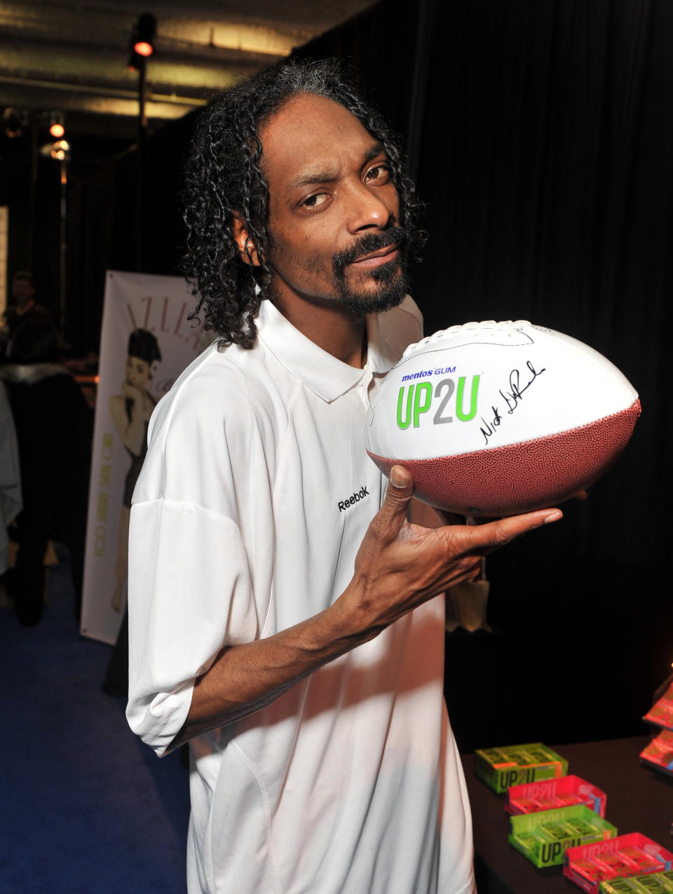 INDIANAPOLIS, IN - FEBRUARY 04: Rapper Snoop Dogg poses with UP2U Gum at DIRECTV Celebrity Beach Bowl 2012 at Victory Field on February 4, 2012 in Indianapolis, Indiana. (Photo by Stephen Lovekin/Getty Images for UP2U Gum)