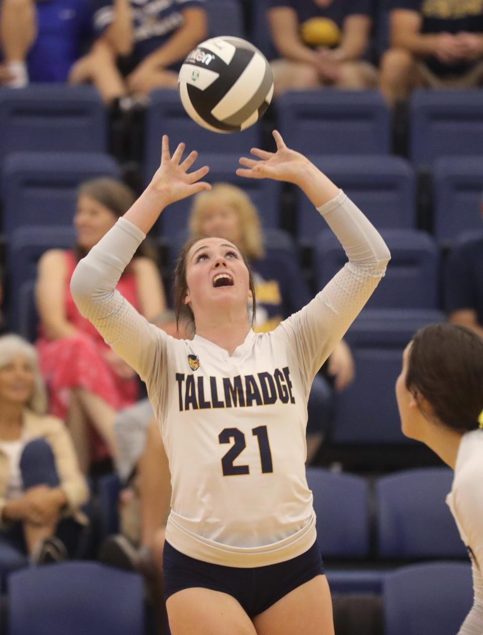 Tallmadge's Lexi Gray sets a ball against Highland on Aug. 30, 2022, in Tallmadge.