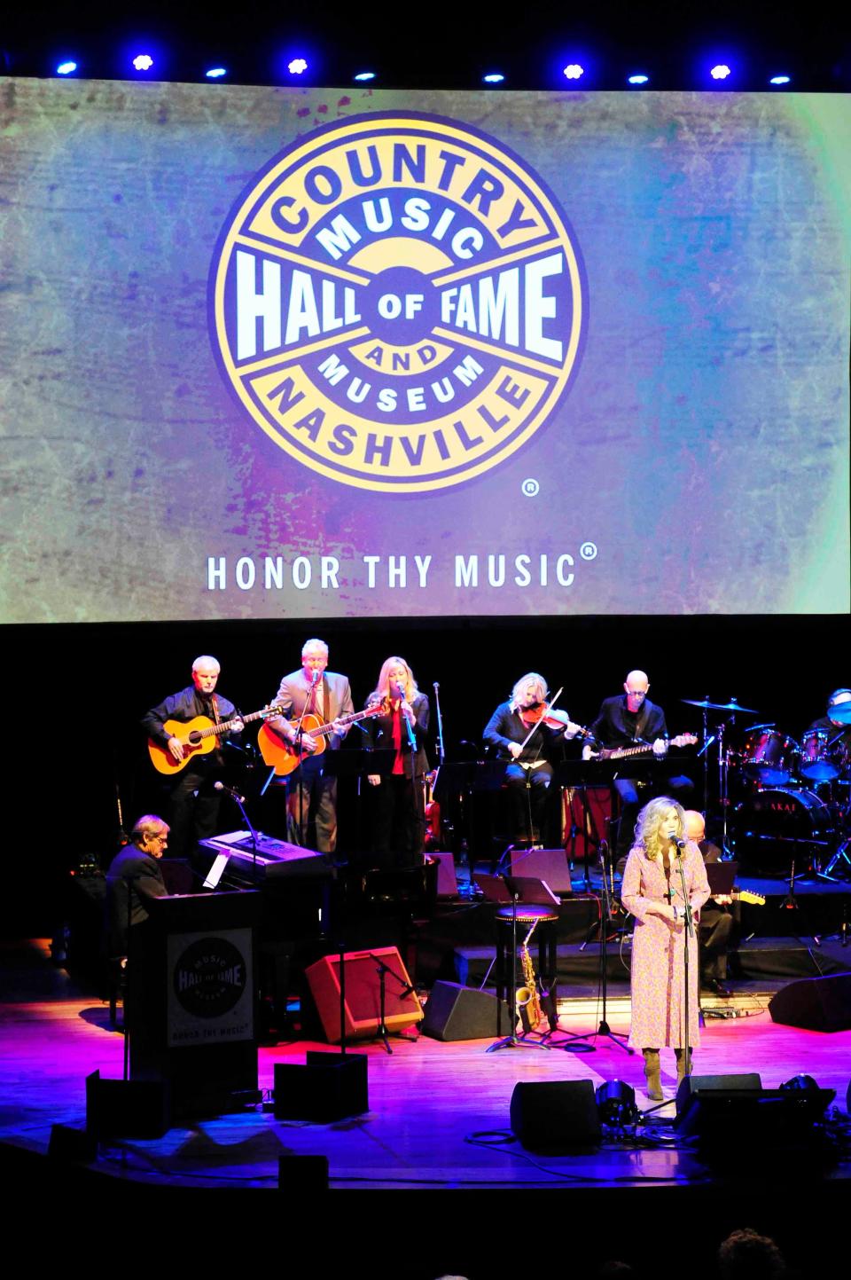 Alison Kraus sings in tribute to Hank Cochran at the Country Music Hall of Fame at the Country Music Hall of Fame and Museum for the induction ceremony Sunday October 26, 2014.