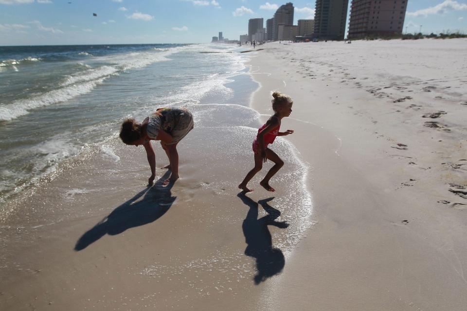 File: Playing in the Gulf of Mexico. (Photo by Joe Raedle/Getty Images)