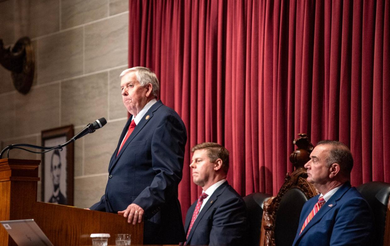 Missouri Gov. Mike Parson begins the annual State of the State speech on the House floor Wednesday with House Speaker Dean Plocher and Lieutenant Governor Mike Kehoe beside him.