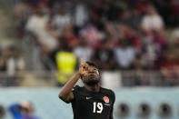 Canada's Alphonso Davies celebrates after scoring the opening goal during the World Cup group F soccer match between Croatia and Canada, at the Khalifa International Stadium in Doha, Qatar, Sunday, Nov. 27, 2022. (AP Photo/Martin Meissner)