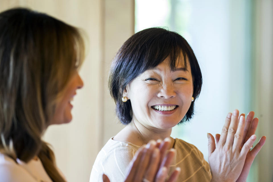 U.S. first lady Melania Trump, left, and Japanese Prime Minister Shinzo Abe's wife Akie Abe clap as they watch a dancer performing a traditional dance during a cultural event at the Japanese style annex inside the State Guest House in Tokyo Monday, May 27, 2019. (Tomohiro Ohsumi/Pool Photo via AP)