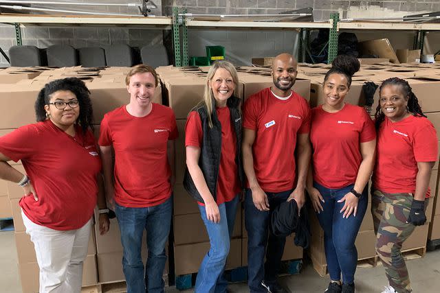 <p>Robert Half</p> The Robert Half Atlanta team packs 432 boxes at the Community Food Center in March.