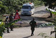 <p>An ambulance with flashing lights leaves the cave rescue area in Mae Sai, Chiang Rai Province, northern Thailand, July 9, 2018. (Photo: Sakchai Lalit/AP) </p>