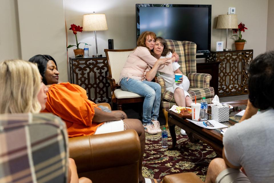 Left to right, Kelli Christensen hugs Tasha Cram at the Hug Tour stop at the Presidential Club Condos in Salt Lake City on Saturday, July 8, 2023. After losing her twin at age 4, Cram is bringing together other twinless twins for support and healing. | Megan Nielsen, Deseret News