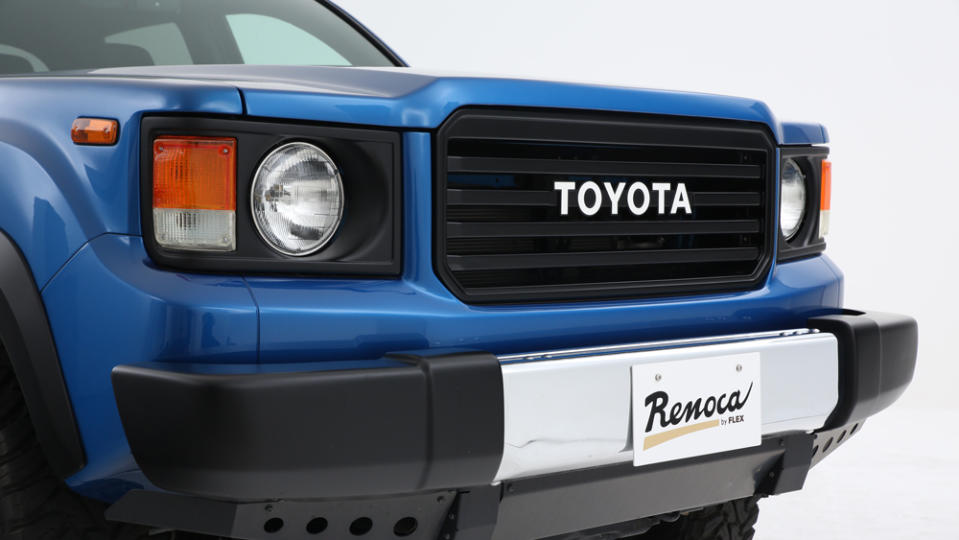 A close-up of the front of Flex Automotive's Renoca Windansea, a retro-styled take on the Toyota Tacoma.