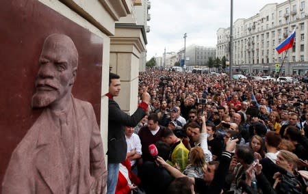 Russian opposition figure Ilya Yashin addresses his supporters at a rally in Moscow